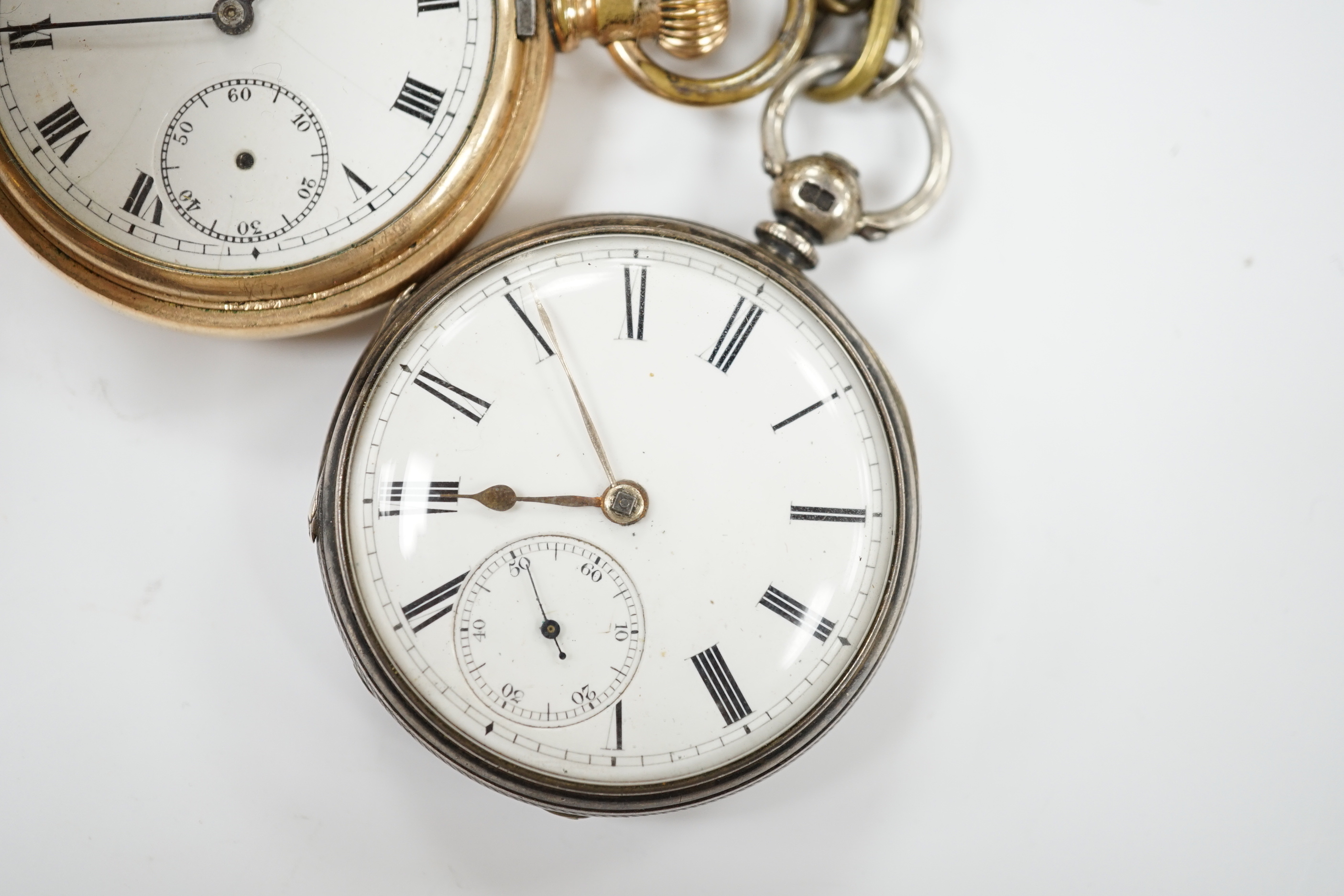 A 1920's silver open face pocket watch and a gold plated hunter pocket watch.
